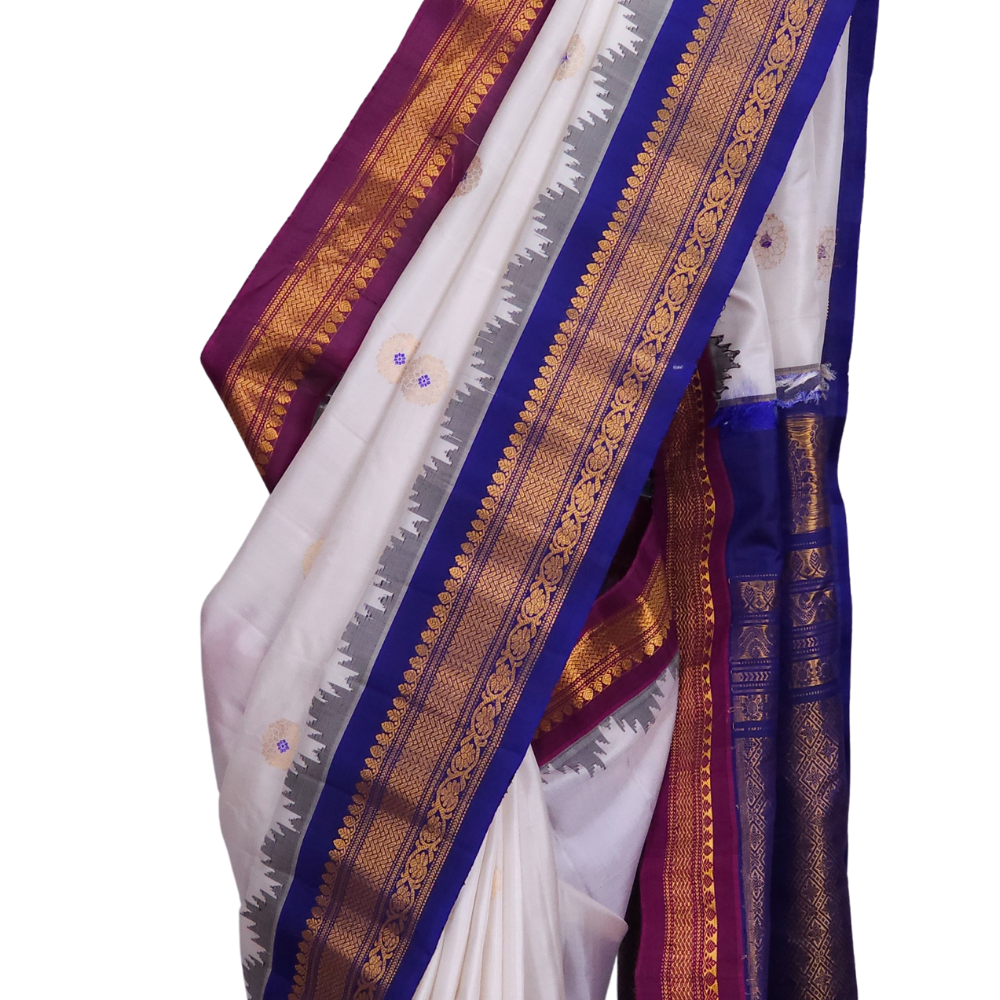 Silk Mark certified Gadwal silk saree in half white with dual Blue Magenta border and rich zari motifs

