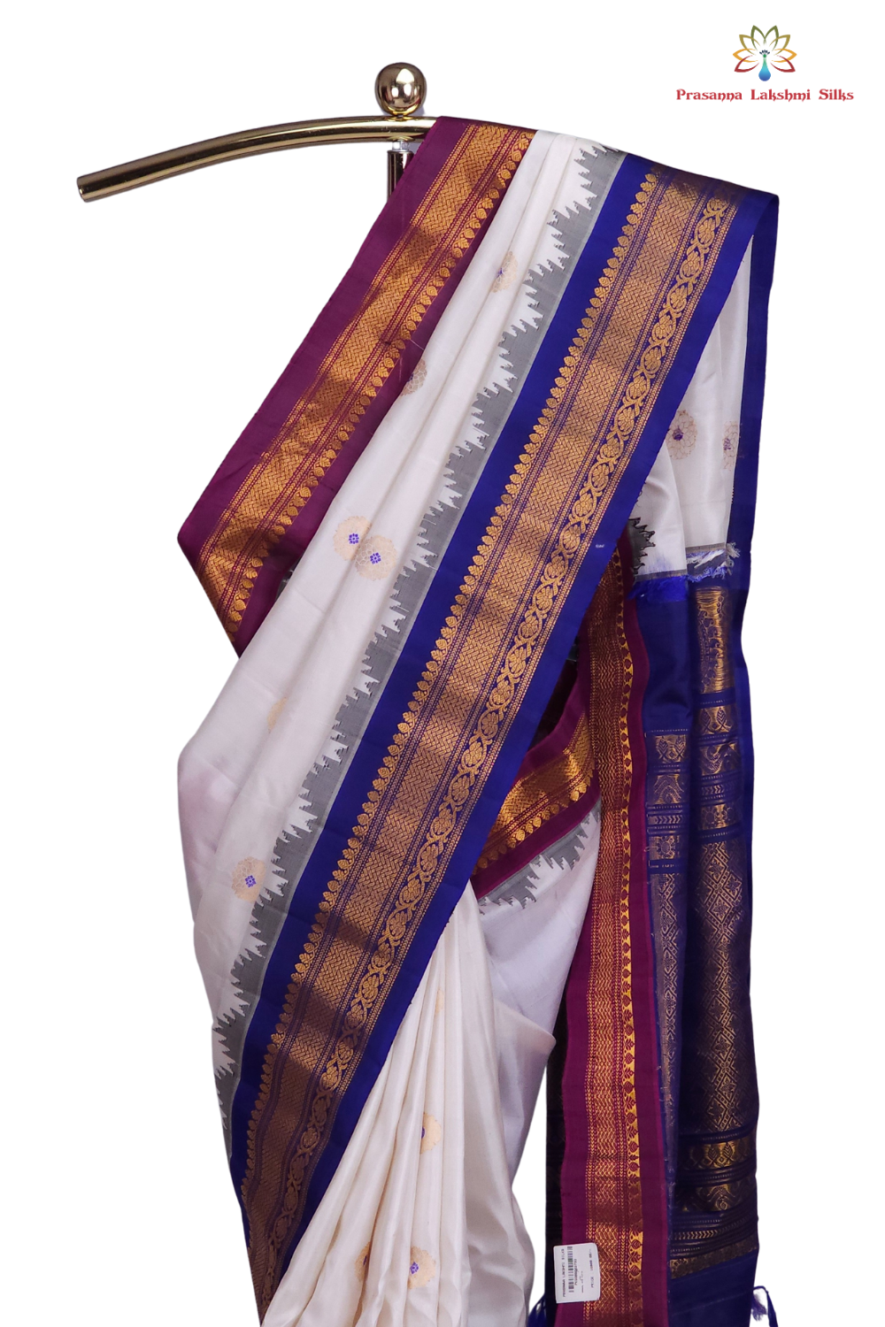 Silk Mark certified Gadwal silk saree in half white with dual Blue Magenta border and rich zari motifs

