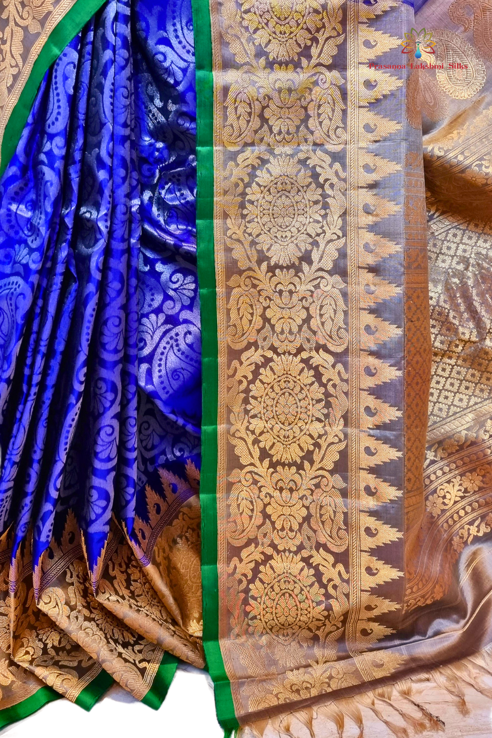 Silk Mark certified Navy Blue Gadwal silk saree with intricate all-over zari brocade design

