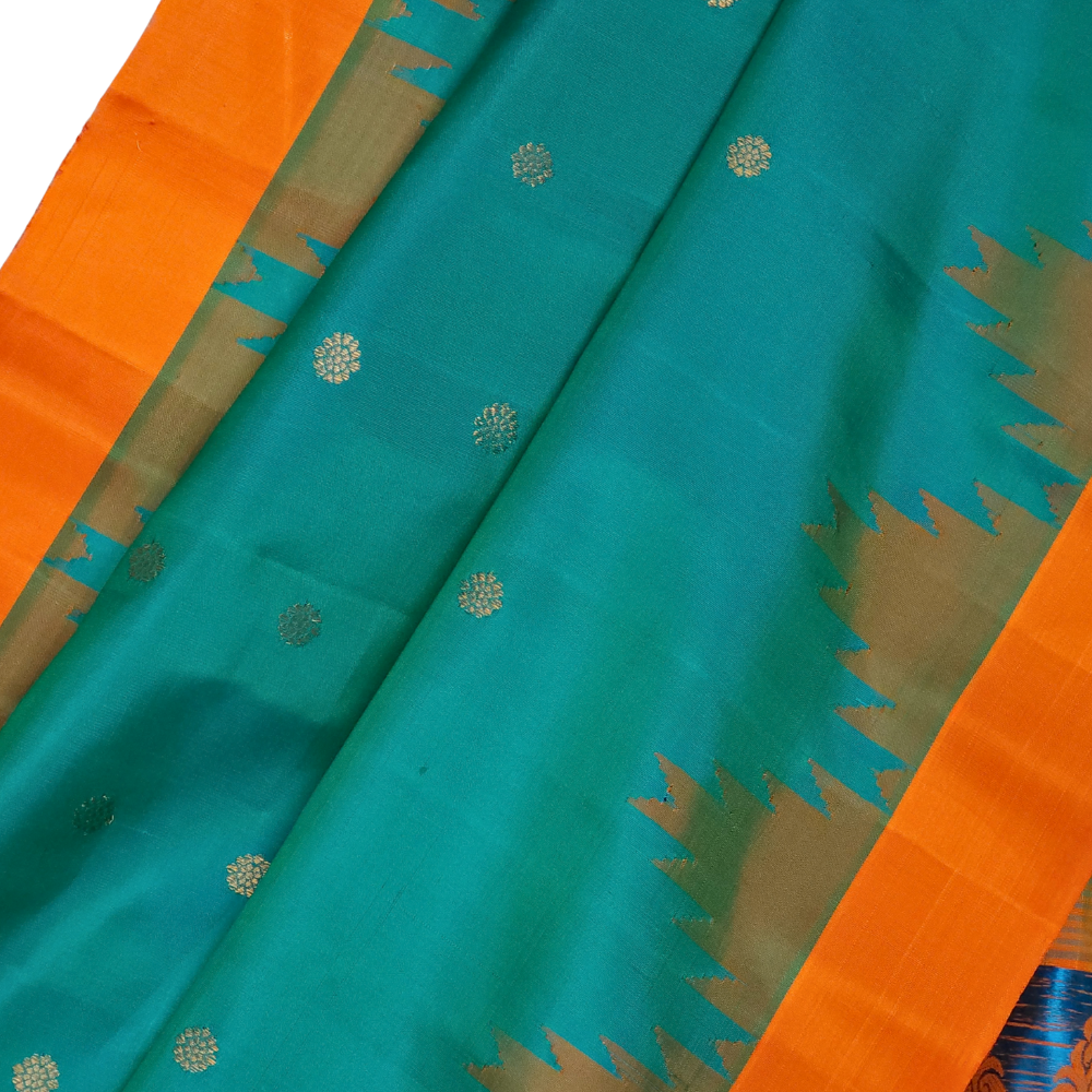 Silk Mark certified Peacock Green Gadwal silk saree with contrast orange border and intricate zari motifs

