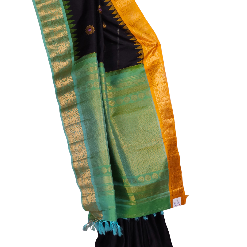 Silk Mark certified black Gadwal silk saree with dual Sea Green Yellow Ganga Jamuna border and intricate zari motifs


