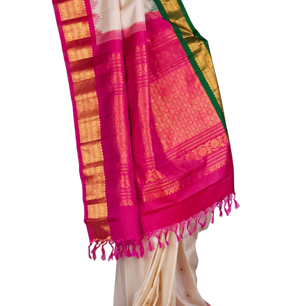 Silk Mark certified half white Gadwal silk saree with dual pink green border and intricate zari motifs

