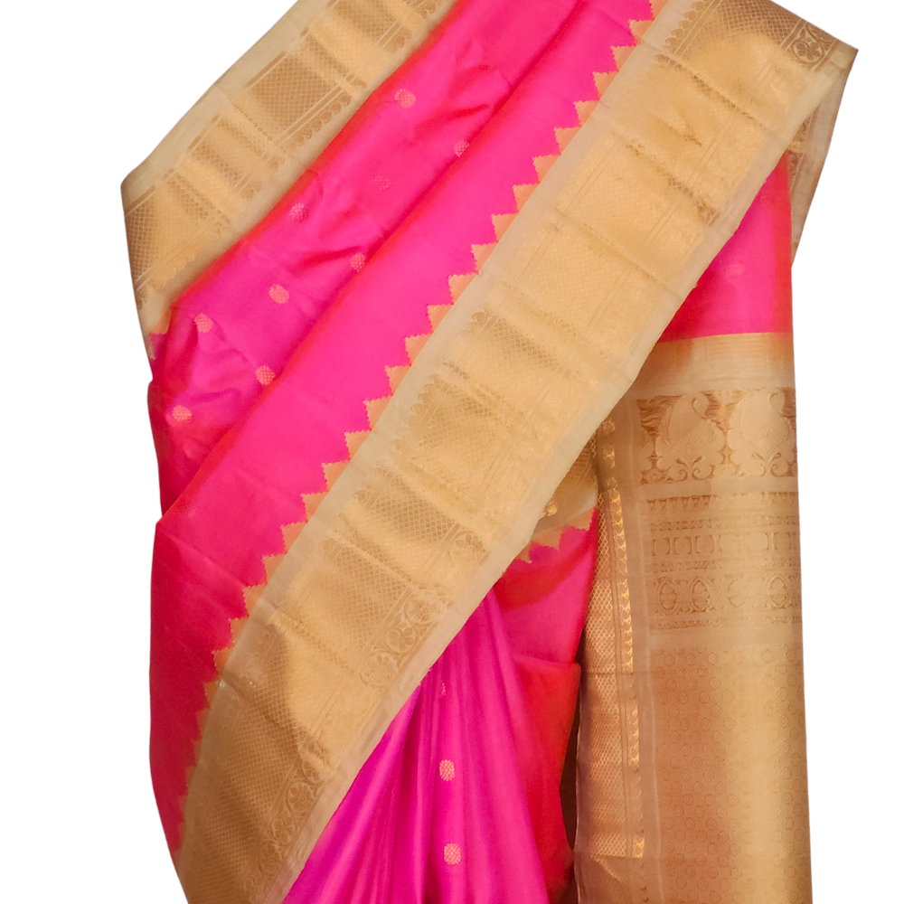 Silk Mark certified hot pink Gadwal silk saree with cream blouse and intricate zari motifs
