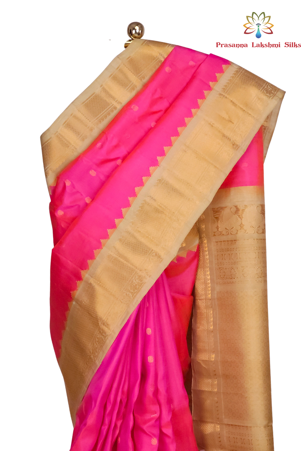 Silk Mark certified hot pink Gadwal silk saree with cream blouse and intricate zari motifs
