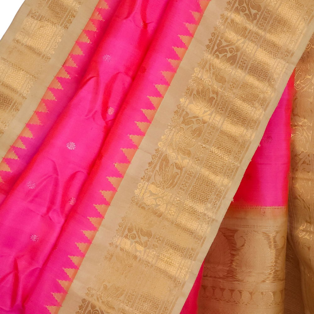 Silk Mark certified lotus pink Gadwal silk saree with beige blouse and intricate zari motifs
