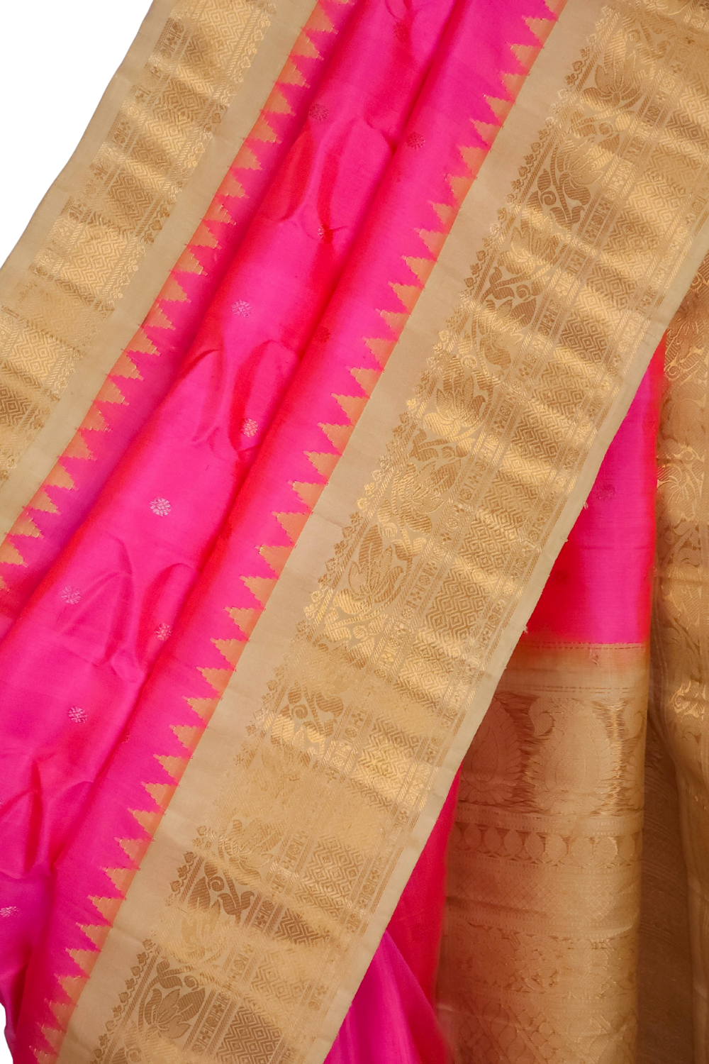 Silk Mark certified lotus pink Gadwal silk saree with beige blouse and intricate zari motifs
