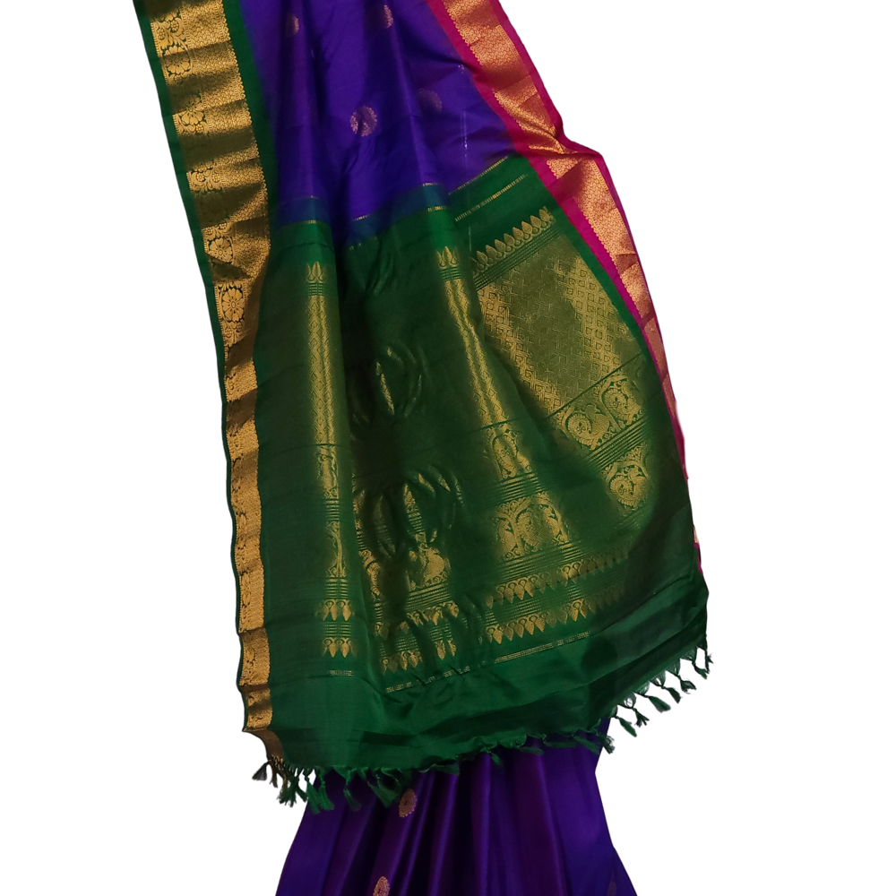 Silk Mark certified violet Gadwal silk saree with dual green pink border and rich zari motifs

