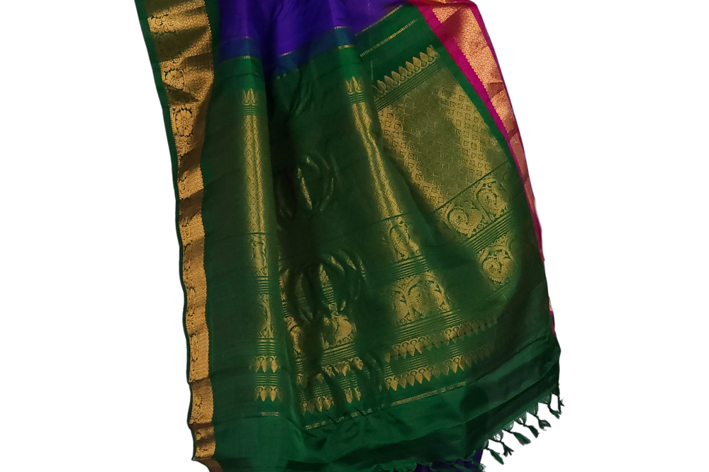 Silk Mark certified violet Gadwal silk saree with dual green pink border and rich zari motifs

