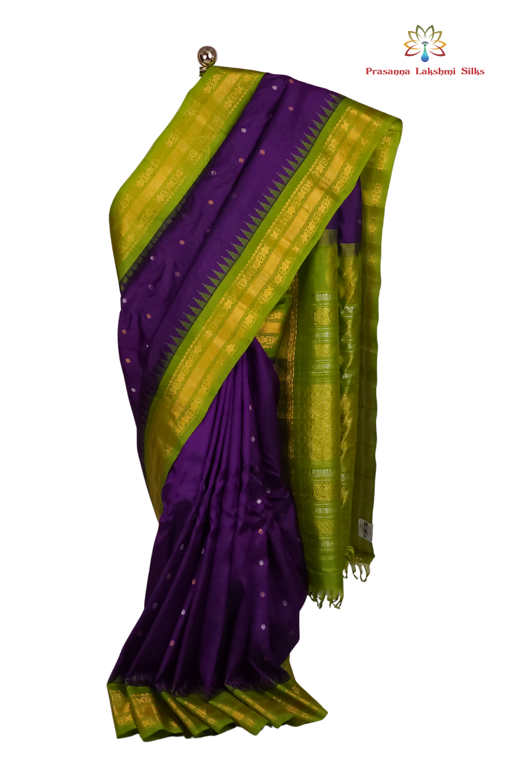 Violet Gadwal silk saree featuring intricate zari motifs and a striking olive green rich zari-woven border, displayed elegantly on a mannequin.